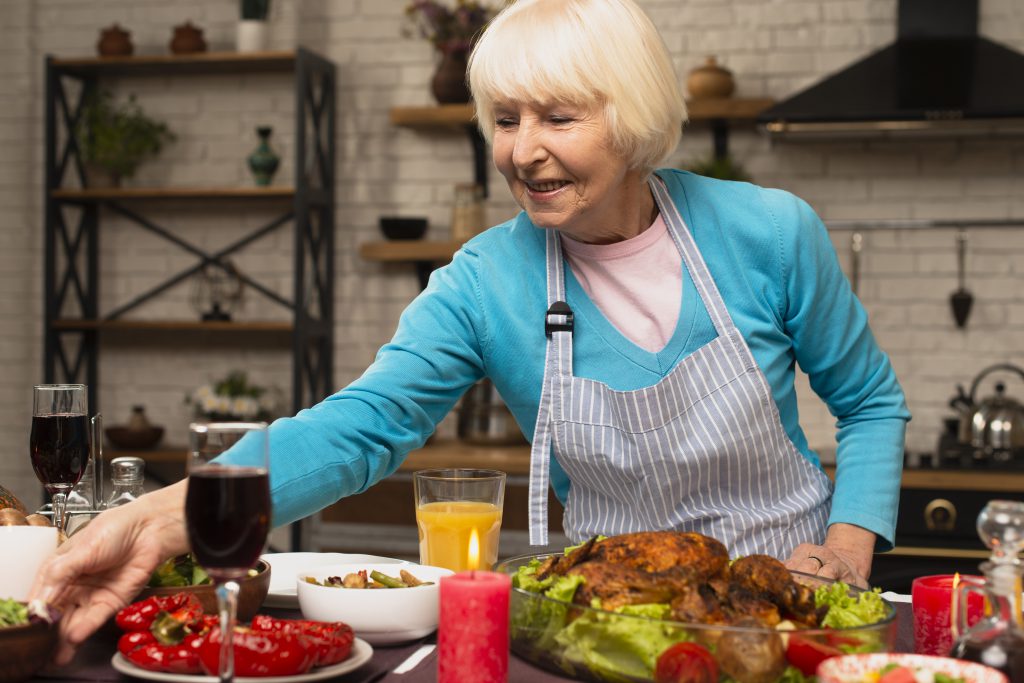 Elderly woman preparing the thanksgiving meal