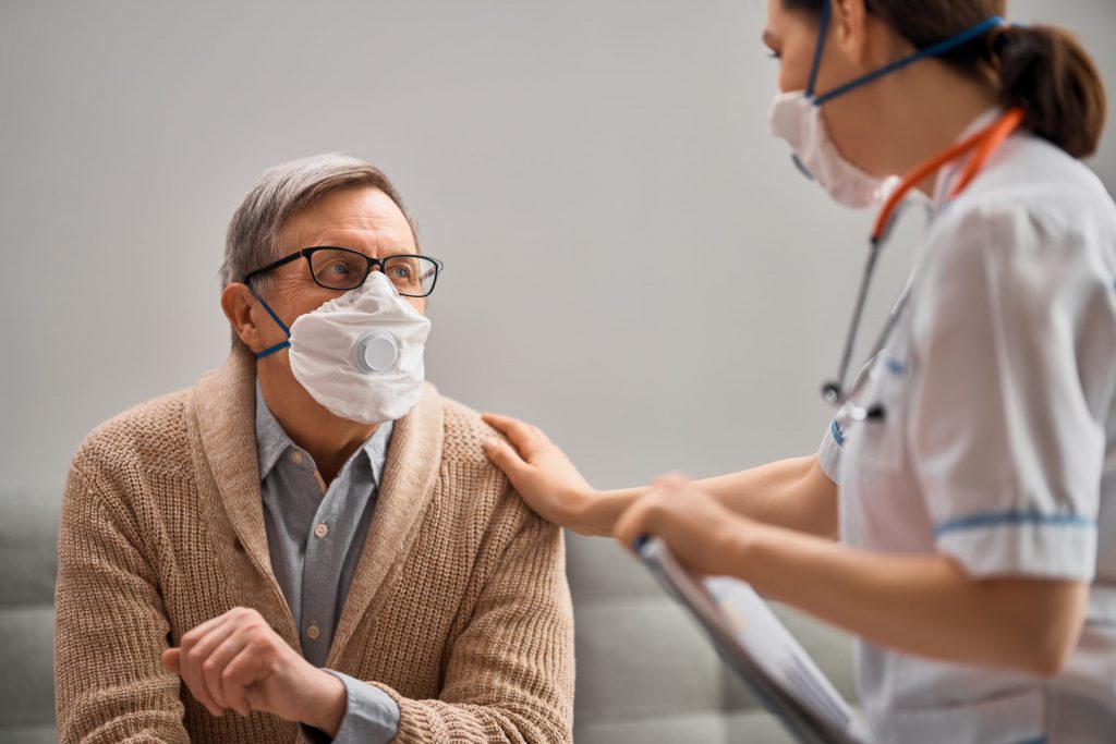 Nurse Communicating with patient
