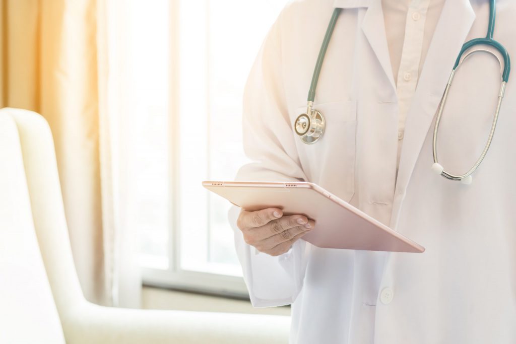 Doctor with Digital Tablet and Medical Stethoscope