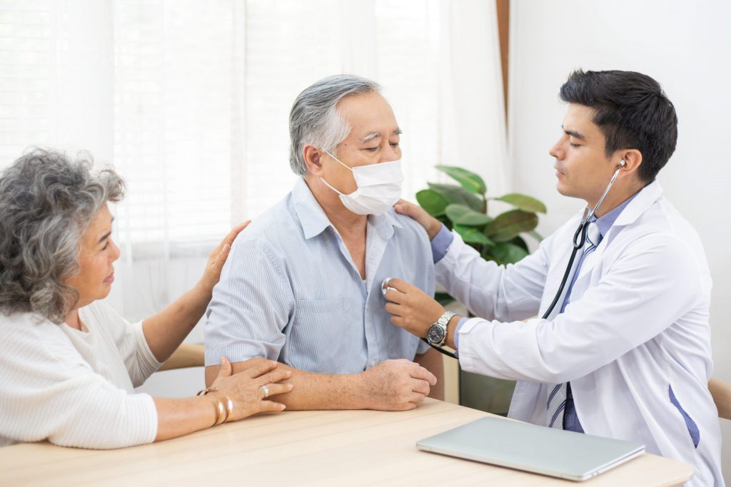 Physician checking Patient with Medical Stethoscope