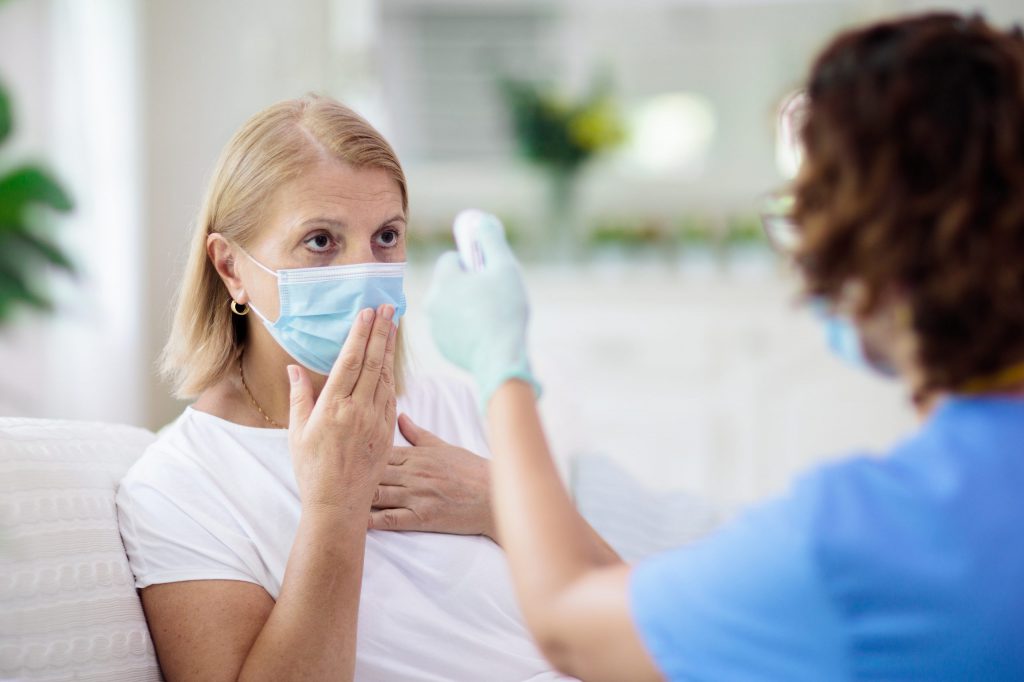 Nurse Communicating with Patient