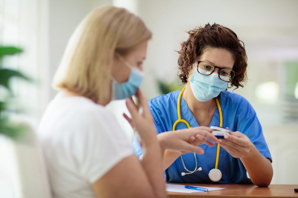 Physician Checking Patient's Oxygen Level