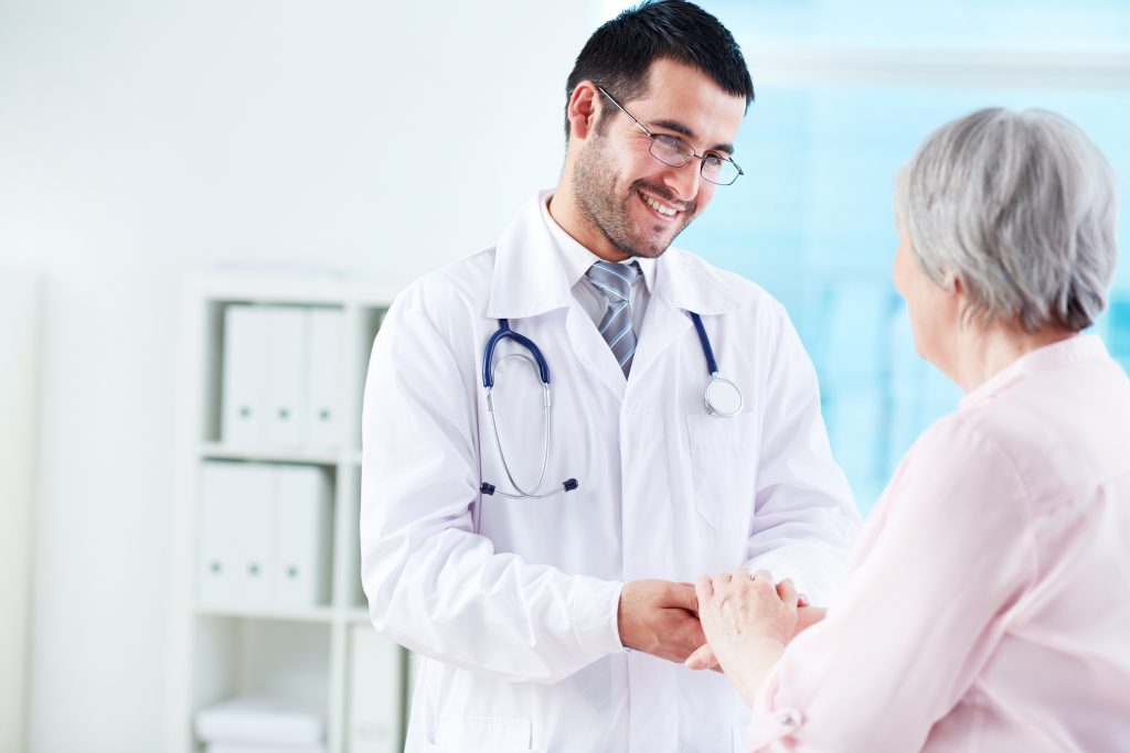 Nurse Communicating with Patient