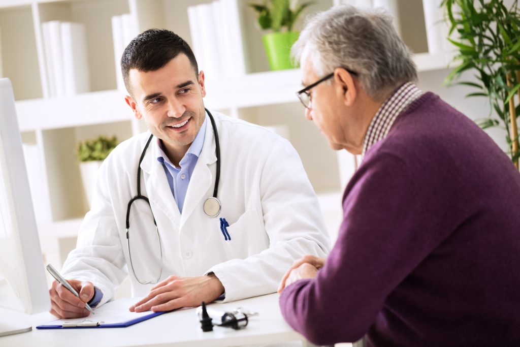 Physician explain something to patient