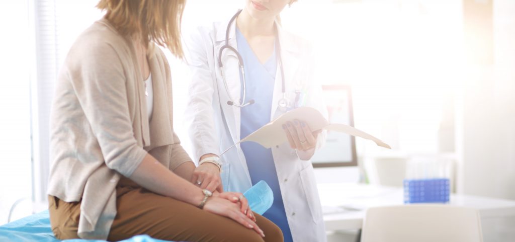Physician Taking Care of Patient