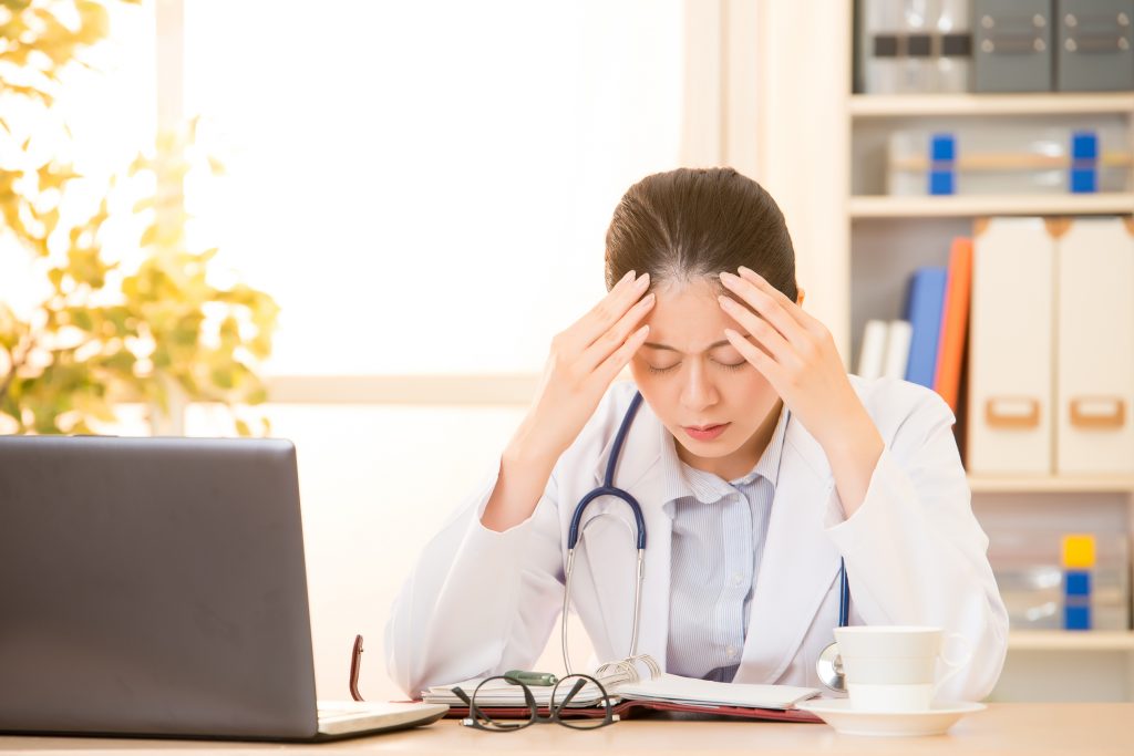 Female Doctor Stressed Out