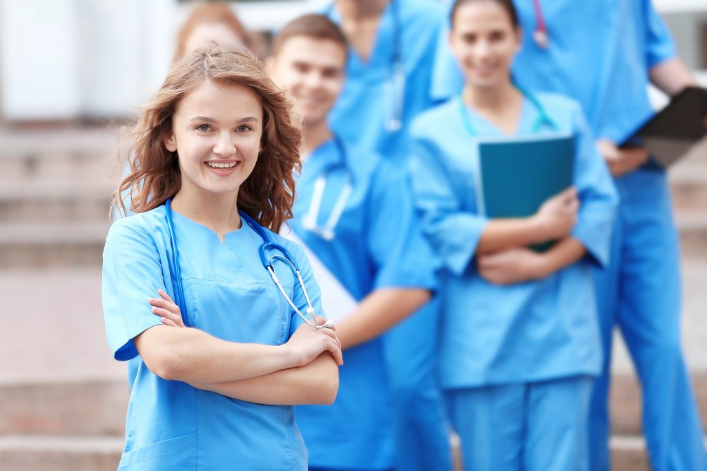 Young Student Nurse with Classmates