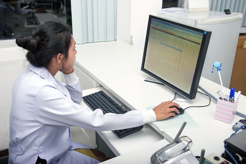 Doctor on computer