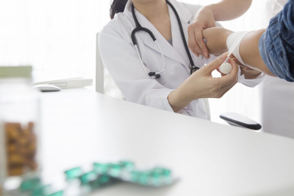 Doctor Healing Wound