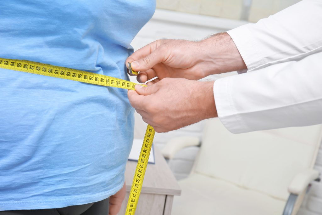 Measuring Waist of an Overweight Patient