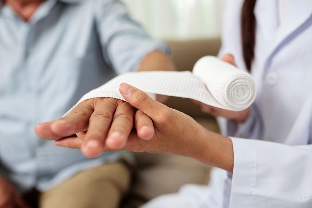Senior man Hand Bandage