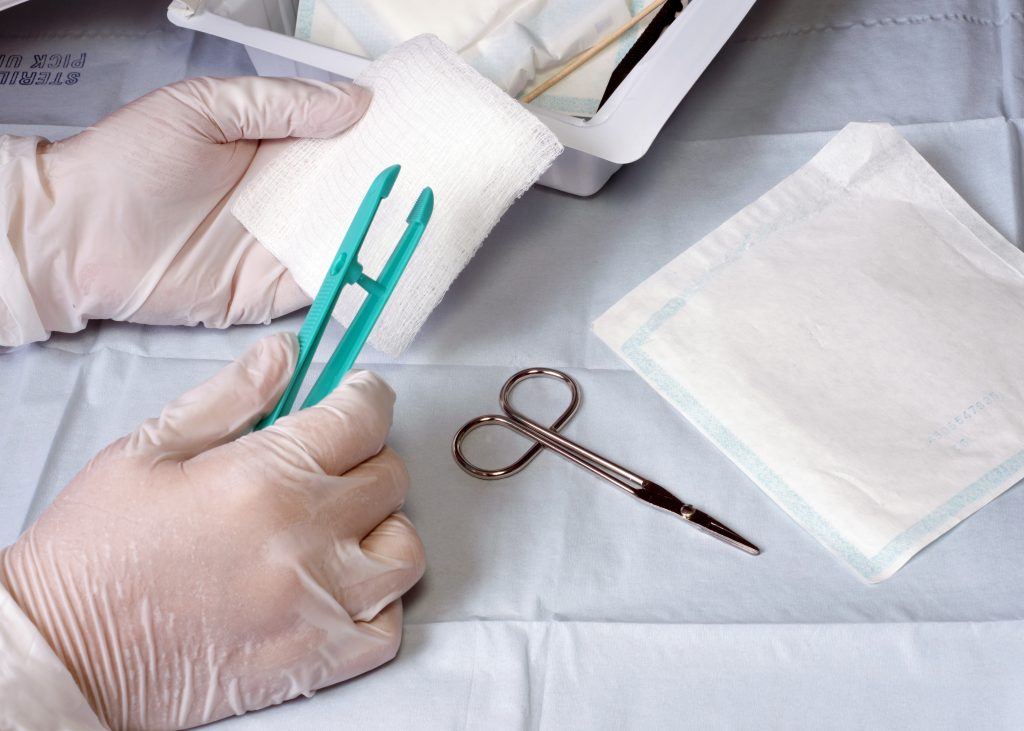 Nurse Prepares Wound Dressing Materials